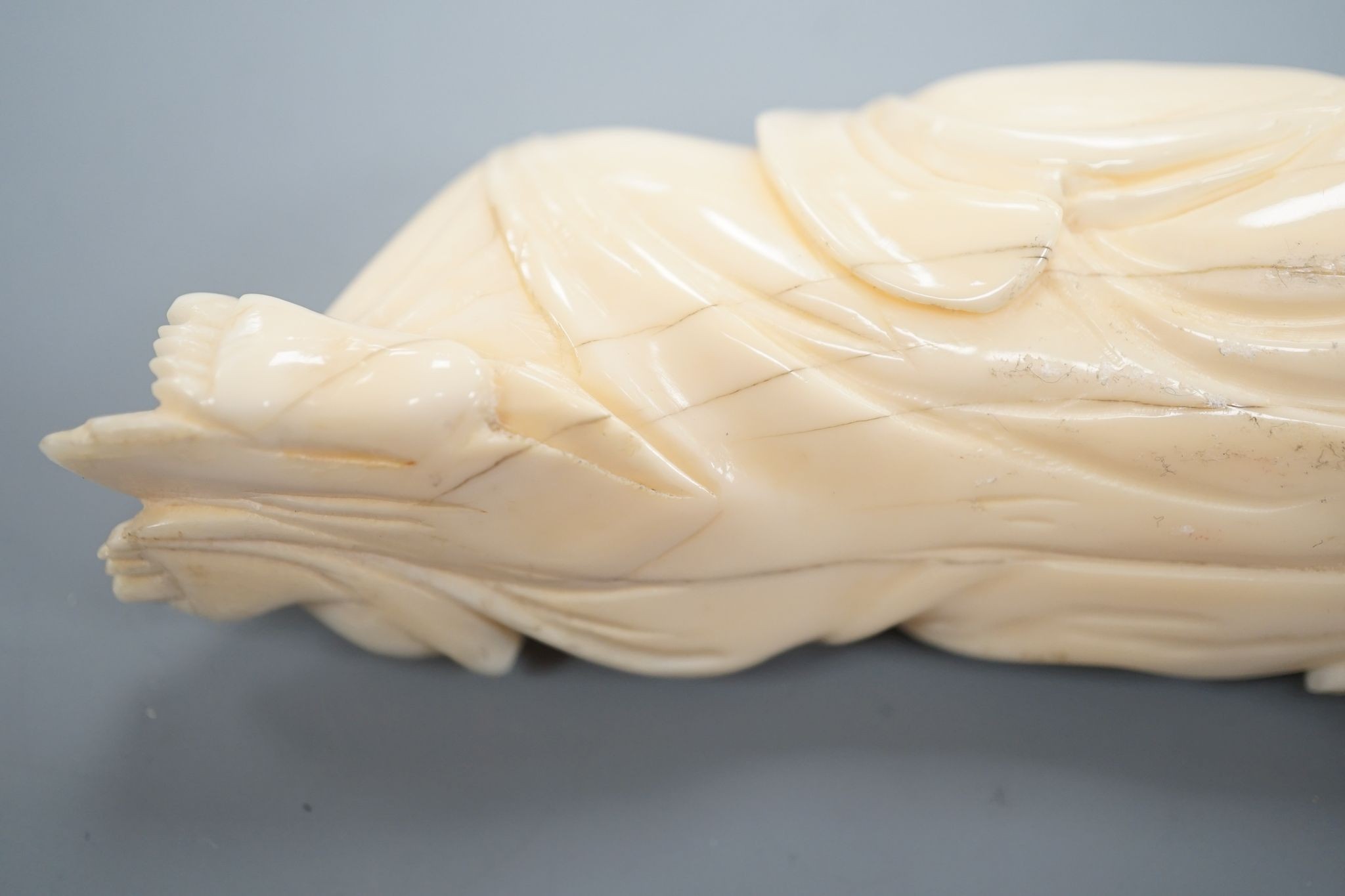 A 19th century Chinese carved ivory figure of Budai 11cm